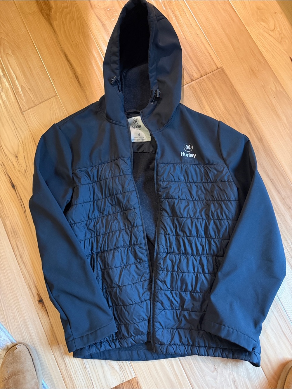 Size medium men’s Hurley cost